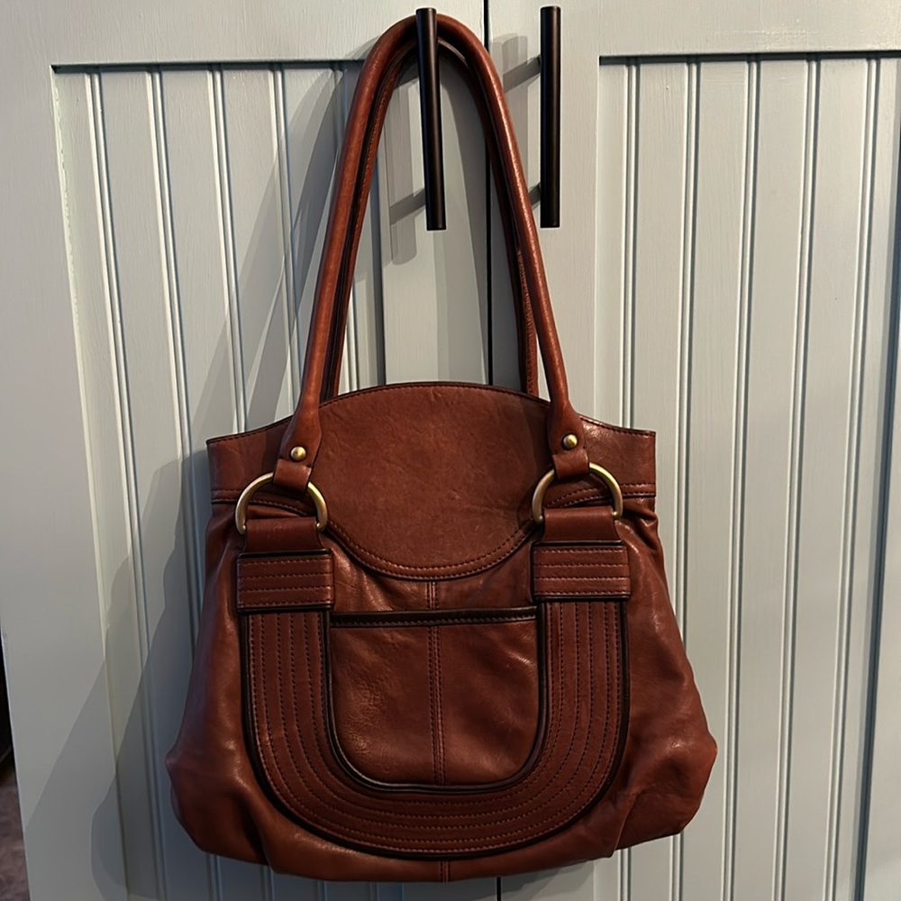 Brown leather NorthStyle shoulder bag.